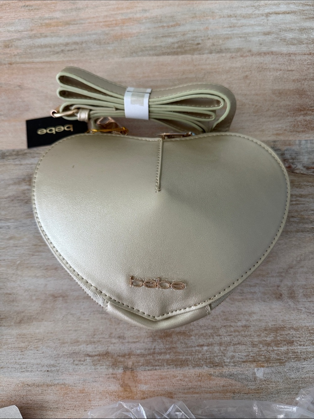 bebe Metallic Cream Heart-Shaped Crossbody Bag with Gold Hardware